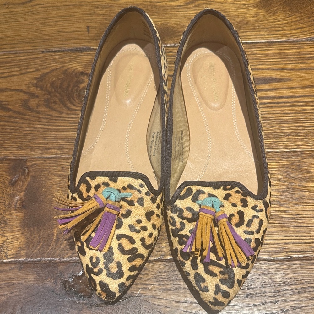 Hush puppies leopard flats with tassels. Good condition.